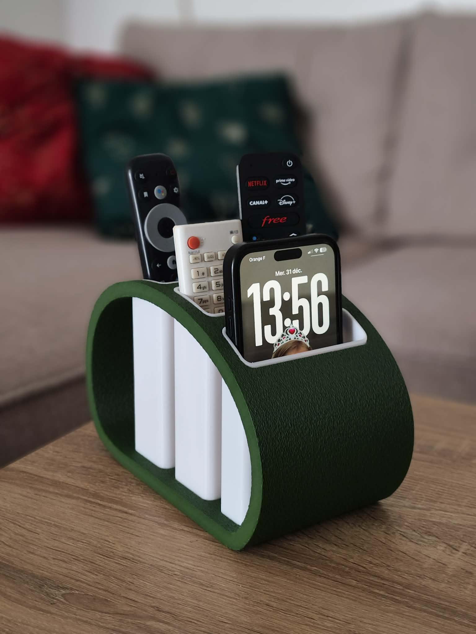 Storage box for 4 remote controls + phone